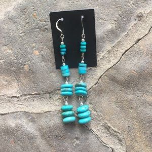 Sterling silver and turquoise dangle earrings.